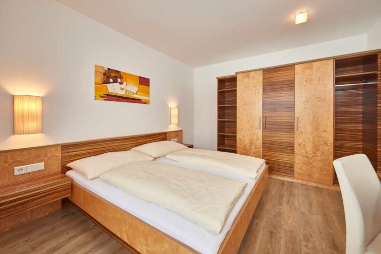 Gemütliches Schlafzimmer im Appartement Schmittenhöhe